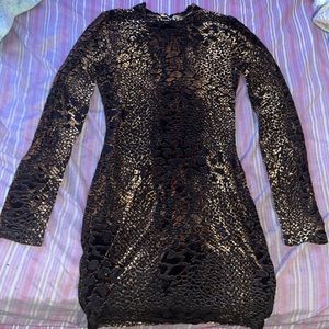 Similar to a “cheetah” pattern. Fashion Nova Dress. Size Medium